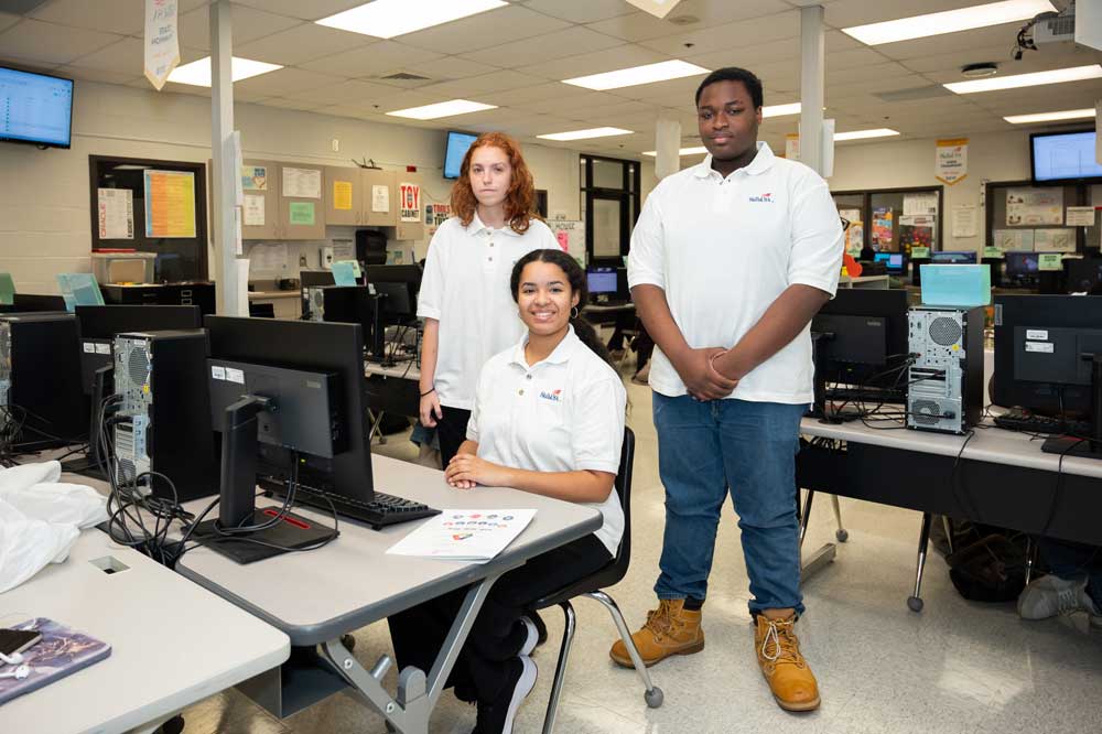 Three students in a computer labe